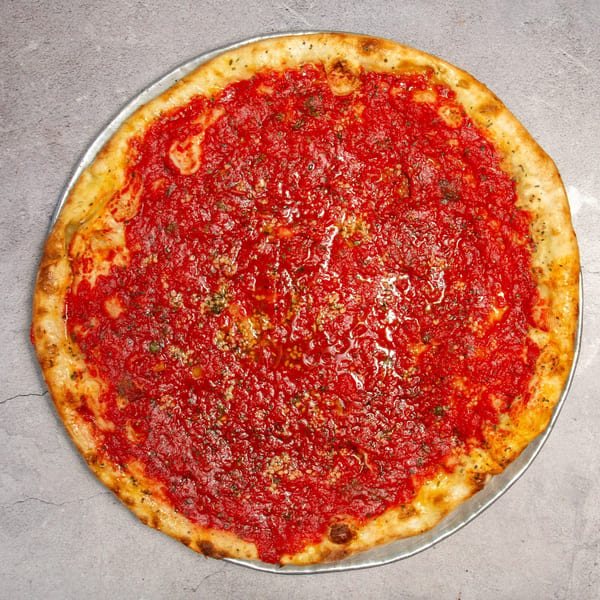 A large, round tomato pie with a thick red sauce and golden crust on a metal pan.